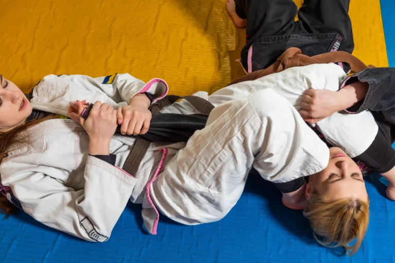young girls practice brazilian jiu jitsu gym Web H scaled